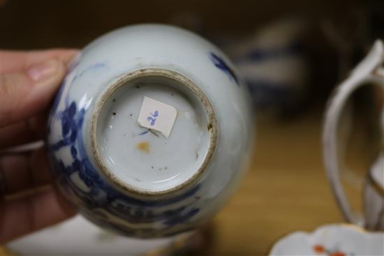 A Meissen floral encrusted cup and saucer, a similar teapot, a Chinese teabowl, two jugs and a scent bottle